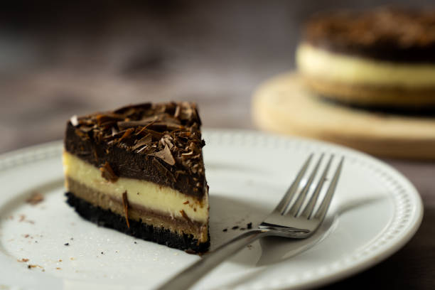 istock Triple chocolate layers baked cheese cake 1423064050
