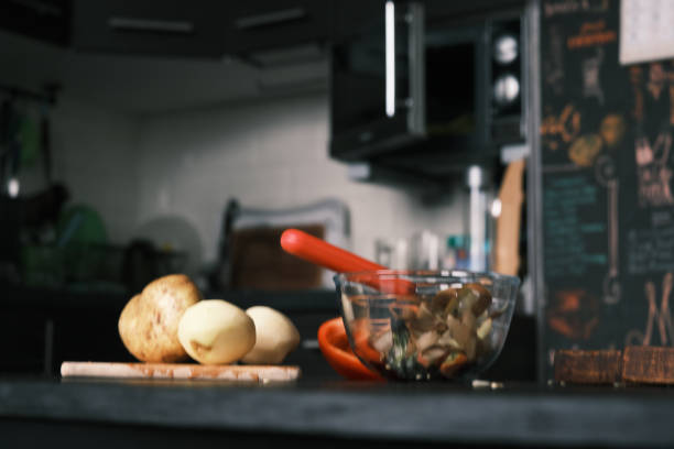 istock Person is cooking vegetables in domestic kitchen 1423072657
