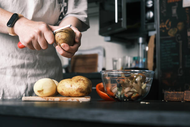 istock Person is cooking vegetables in domestic kitchen 1423072877
