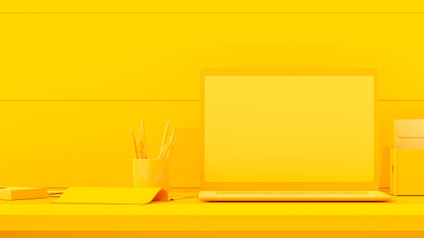 istock Yellow laptop Mock-Up empty display is placed on the desk. 1423073488