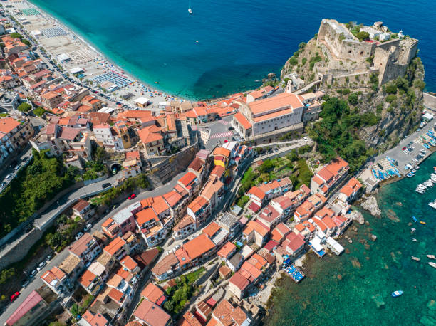 Aerial view of Scilla, Reggio Calabria, Calabria. Italy. Ruffo Castle and lighthouse. Aerial view of Scilla, Reggio Calabria, Calabria. Promontory at the northern entrance of the Strait of Messina. Ruffo Castle and lighthouse. Tyrrhenian Sea. Italy castle scilla stock pictures, royalty-free photos & images