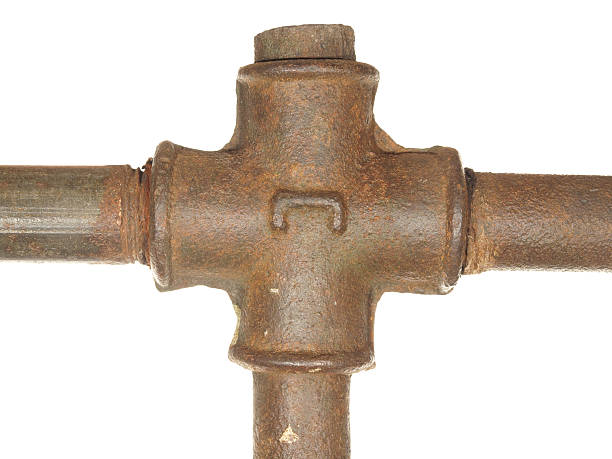 fragment of the old water conduit consisting of pipes and fittings.
