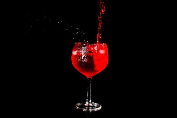 istock Red wine pouring into a glass sps 1423081867