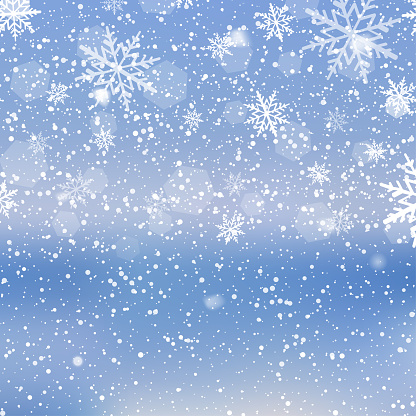 Winter snowfall and snowflakes on light blue background. Xmas and New Year background. Vector illustration