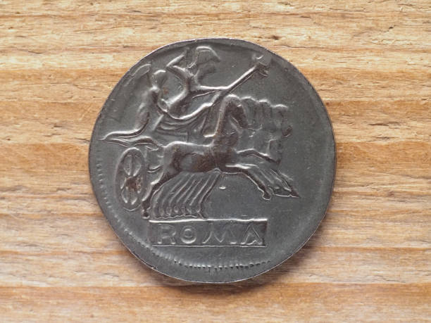 istock Ancient Roman didrachm coin reverse showing Jupiter chariot 1423084915