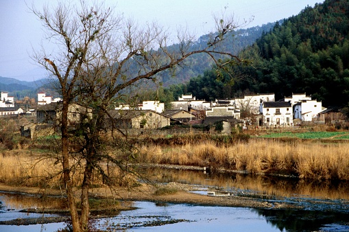 Nearly a hundred years ago, Wuyuan belonged to Huizhou in ancient China. Its architectural style is the most representative in southern China. Photographic slide  photo in Dec 2003, Wuyuan County, Jiangxi Province