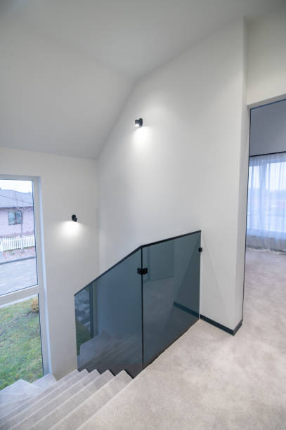 istock Modern home interior with the hallway and stairs 1423091952