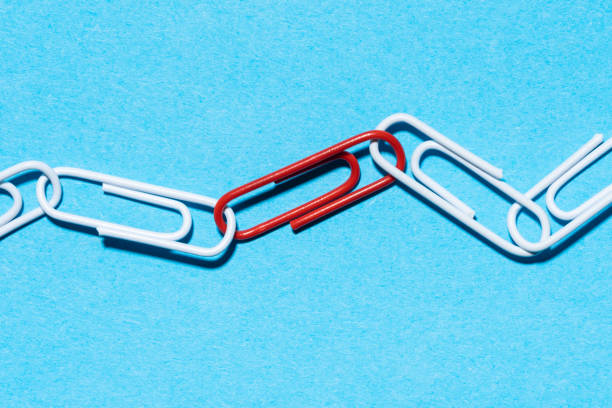 Chain made of paperclips with one red link