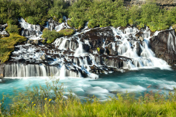 Iceland waterfall Hraunfossar waterfall hraunfossar stock pictures, royalty-free photos & images