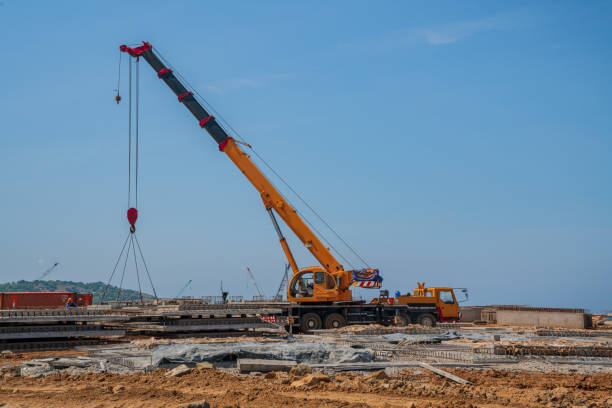 istock Heavy crane vehicle on construction site 1423092564