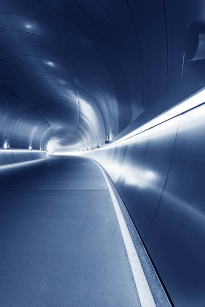 istock Empty futuristic modern tunnel in the dark 1423093695