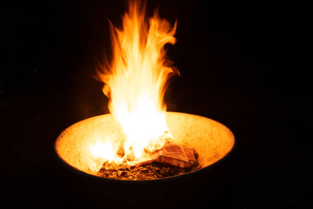 istock Close-Up Of Fire Against Black Background 1423097832