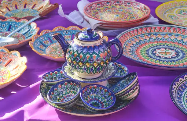 Uzbek dishes on a purple tablecloth