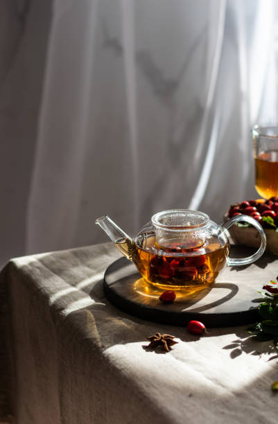istock Rosehip hearbal tea on wooden board. Vertical 1423099256