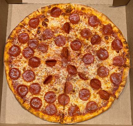 Classic Pepperoni Pizza in a pizza box.