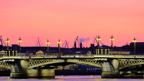 Petersburg bridge in a pink-purple sunset