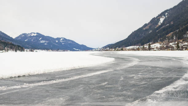 istock Lake Weissensee on a cold day in winter 1423104729