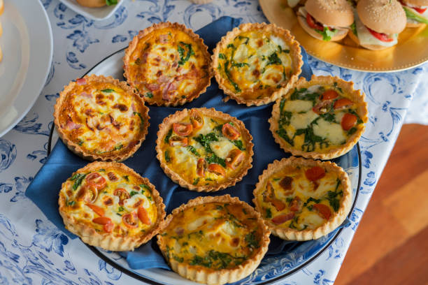 delicious food dishes prepared at home by a hostess who prepares herself to attend to her guests in her free time