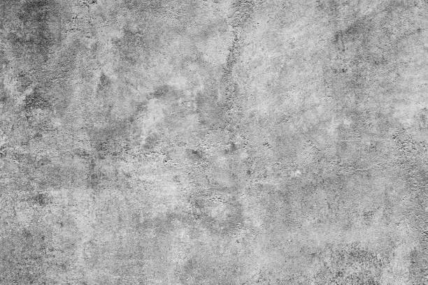 istock Closeup of textured grey concrete wall 1423106979