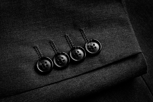 Closeup of suit buttons for business or formal wear