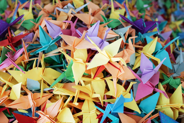 istock Colorful origami birds on the table 1423108912