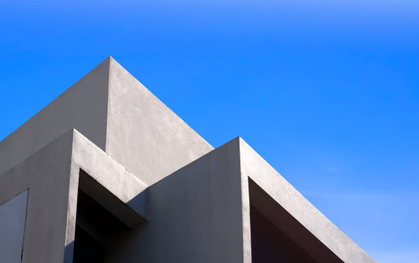 istock Minimal geometric architecture background of modern beige building against blue sky 1423110653