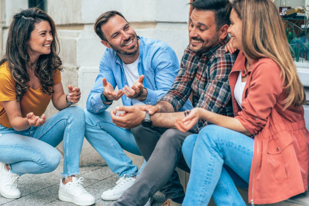 istock Friends having fun outdoors in the city 1423116755