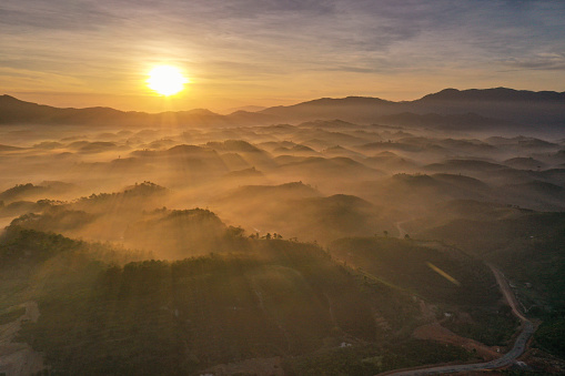 Drone view sunrise on Dai Lao mountain, Bao Loc city, Lam Dong province, south highlands Vietnam