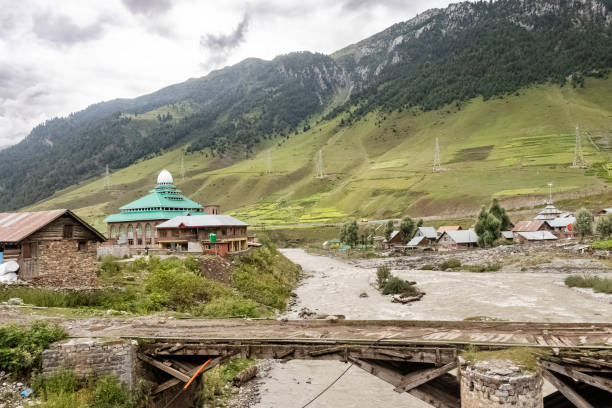 istock Beautiful mountain scenery. River, valley, snow, blue sky, white clouds. In-depth trip on the Sonamarg Hill Trek in Jammu and Kashmir, India 1423121230