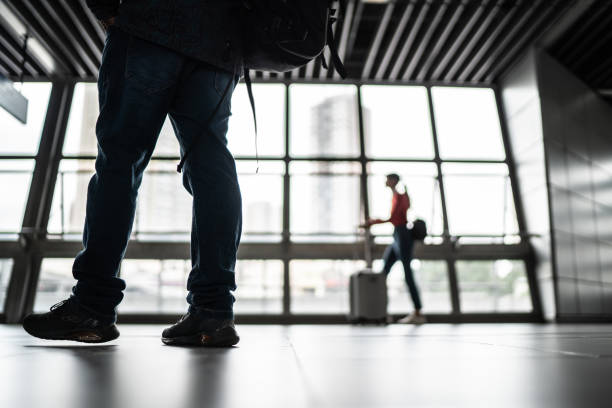 Low section of a man in a subway station
