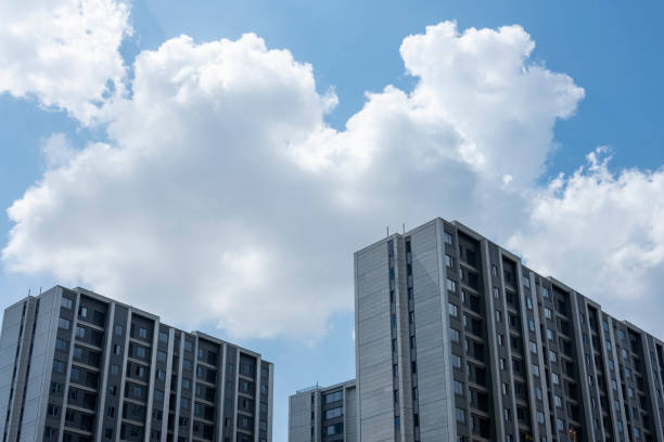 Free Stock Photo of Tall apartment building under a beautiful blue sky ...