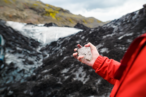 Holding a piece of centuries old glacier ice history in your hand