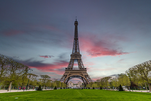 Paris, France - April 21, 2017: Photo of The Eiffel Tower of a wrought iron lattice tower on the Champ de Mars in Paris in France, which is one of the Greatest Tourist Attraction in Europe. It is named after the engineer Gustave Eiffel, whose company designed and built the tower from 1887 to 1889. The tower is 324 meters tall, about the same height as an 81-story building, and is the tallest structure in Paris.