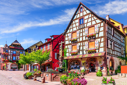 Kaysersberg Vignoble, France. Picturesque street with traditional half timbered houses on the Alsace Wine Route.
