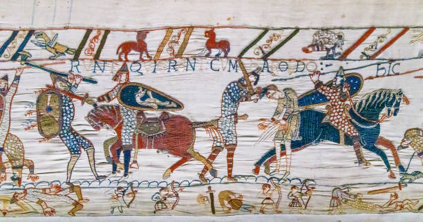Bayeux, Normandy in northwestern France. Bayeux, Normandy in northwestern France. A scene from the Bayeux Tapestry. tapestry stock pictures, royalty-free photos & images