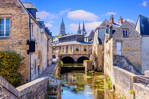 Bayeux, Normandy in northwestern France. The historic centre, the Notre Dame Cathedral and the Aure river.
