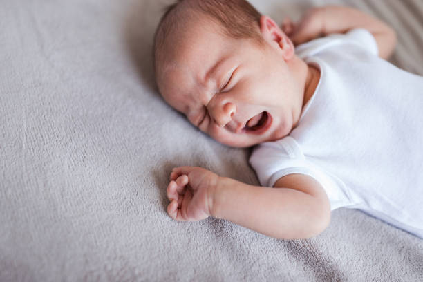 istock Baby crying in pain 1423137521