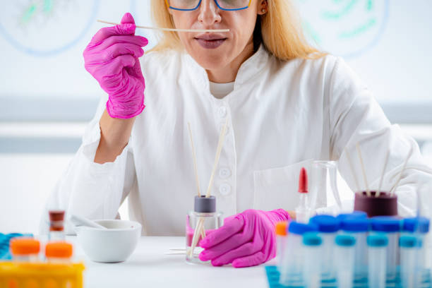 istock Perfumer Holding a Stick with Aromatic Oil. 1423137533