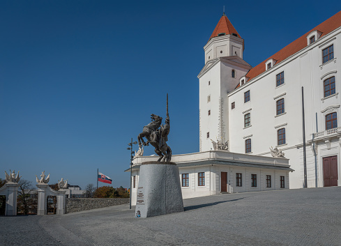 Bratislava Castle Honorary Court with Svatopluk the Great statue and Flag of Slovakia - Bratislava, Slovakia