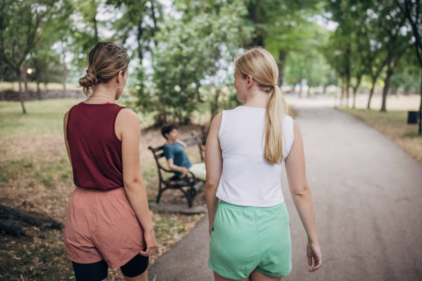 istock Women taking a walk in park 1423144013