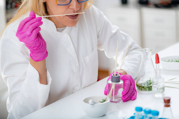 istock Perfumer Holding a Stick with Aromatic Oil. 1423144230