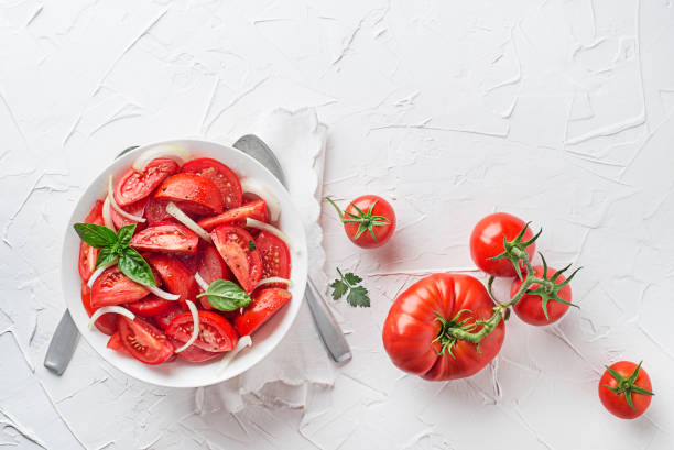 istock Tomato salad with onion 1423145790