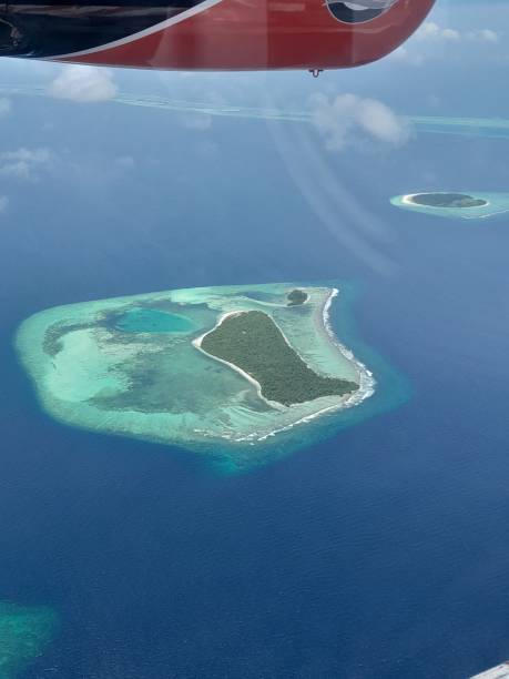 istock Maldives island view from the seaplane. 1423149838