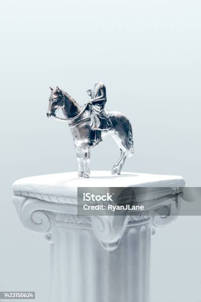 Headless Horseman Figurine On White Pedestal Stock Photo - Download Image Now - Bizarre, Statue, Horse