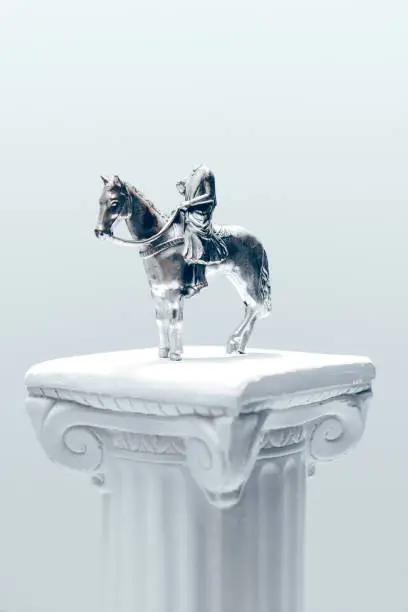 Photo of Headless Horseman Figurine on White Pedestal