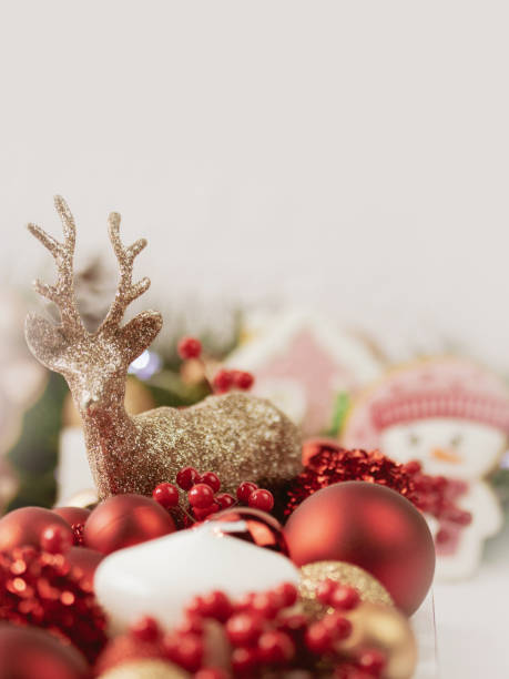 istock Bright Christmas Background with gold reindeer on light background 1423153777