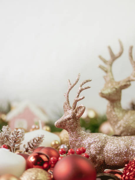 istock Bright Christmas Background with gold reindeer on light background 1423153780