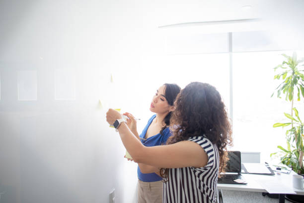 istock coworkers in the office 1423155485