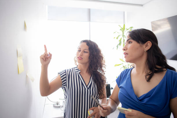 istock coworkers in the office 1423155508