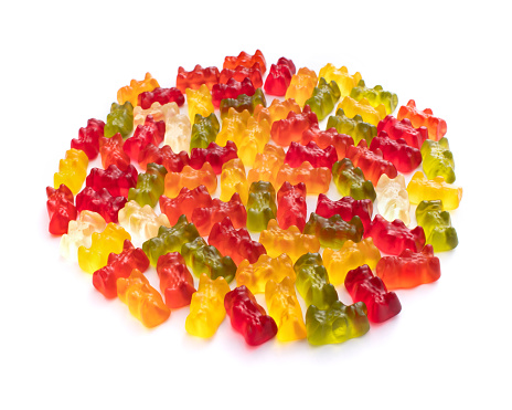 Colorful gummy bears bunch against white background